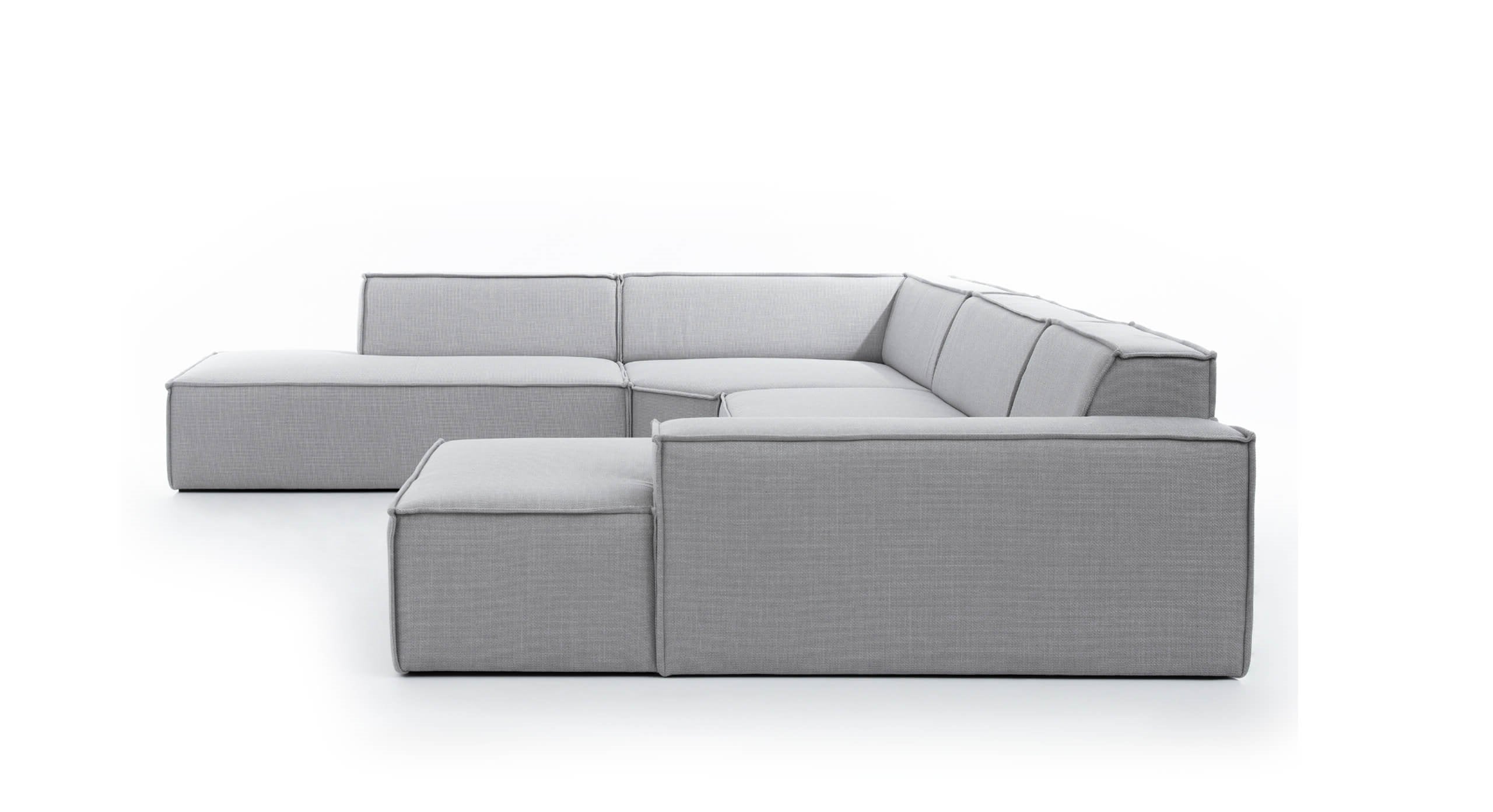 U-bank Sense met chaise longue rechts, uitgevoerd in een moderne grijze stof zonder decoratieve kussens of accessoires. Minimalistisch en strak design dat perfect aansluit bij een eigentijdse en stijlvolle woonruimte.